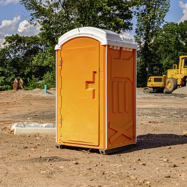 what is the cost difference between standard and deluxe portable restroom rentals in Foster County